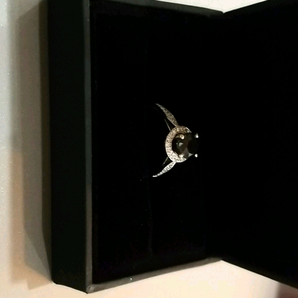 Black diamond and white diamond ring
